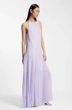 Sleeveless dress with plissé skirt inserts