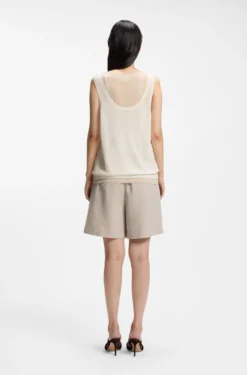Sleeveless top in linen and cotton with layered design
