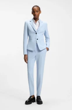 Slim-fit trousers in stretch fabric with logo rivet