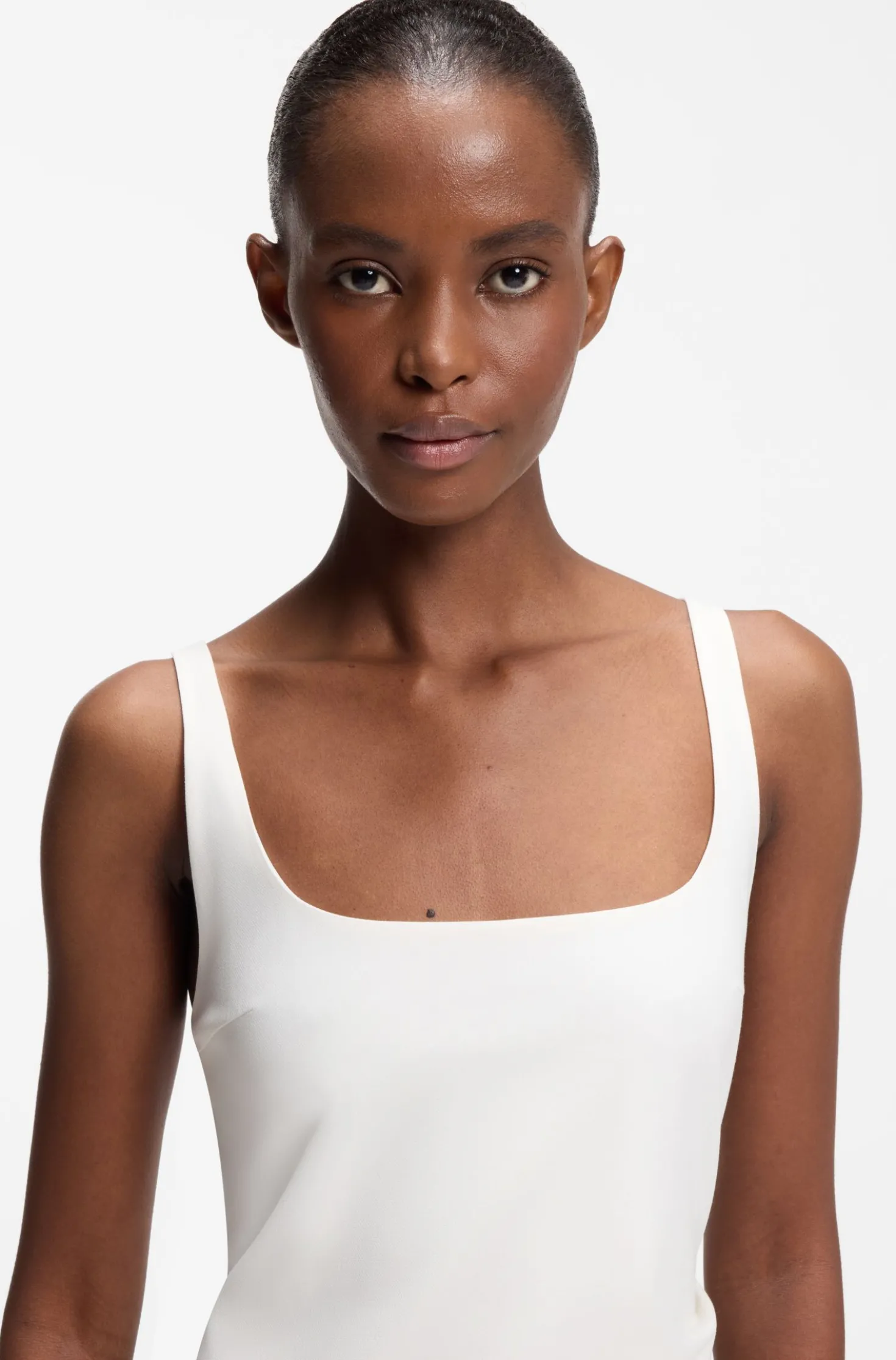 Square-neck dress with golden chain belt