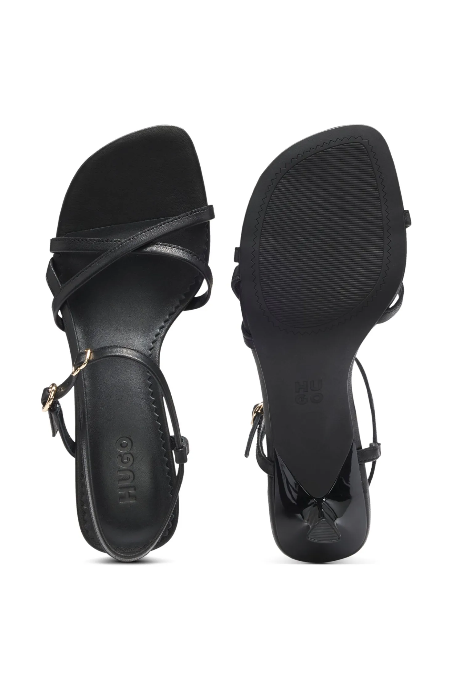 Strappy sandals in leather with asymmetric heel