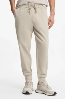 Stretch-cotton tracksuit bottoms with cuffed hems