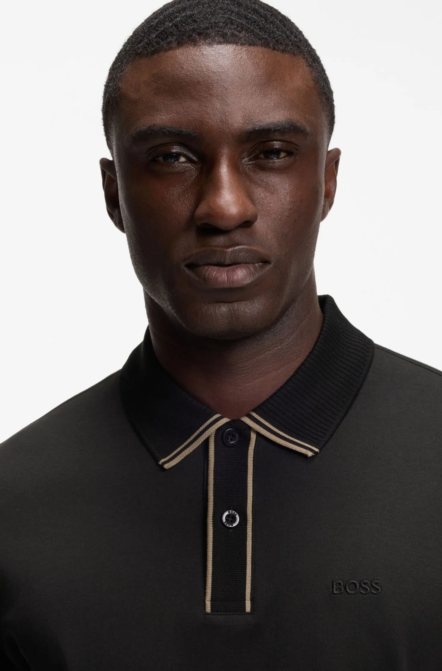 Striped-trim polo shirt in interlock cotton