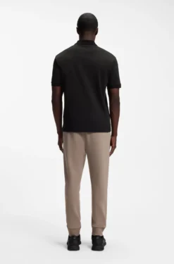 Striped-trim polo shirt in interlock cotton
