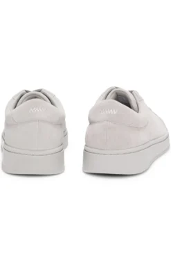 Suede trainers with gold-tone foil logo