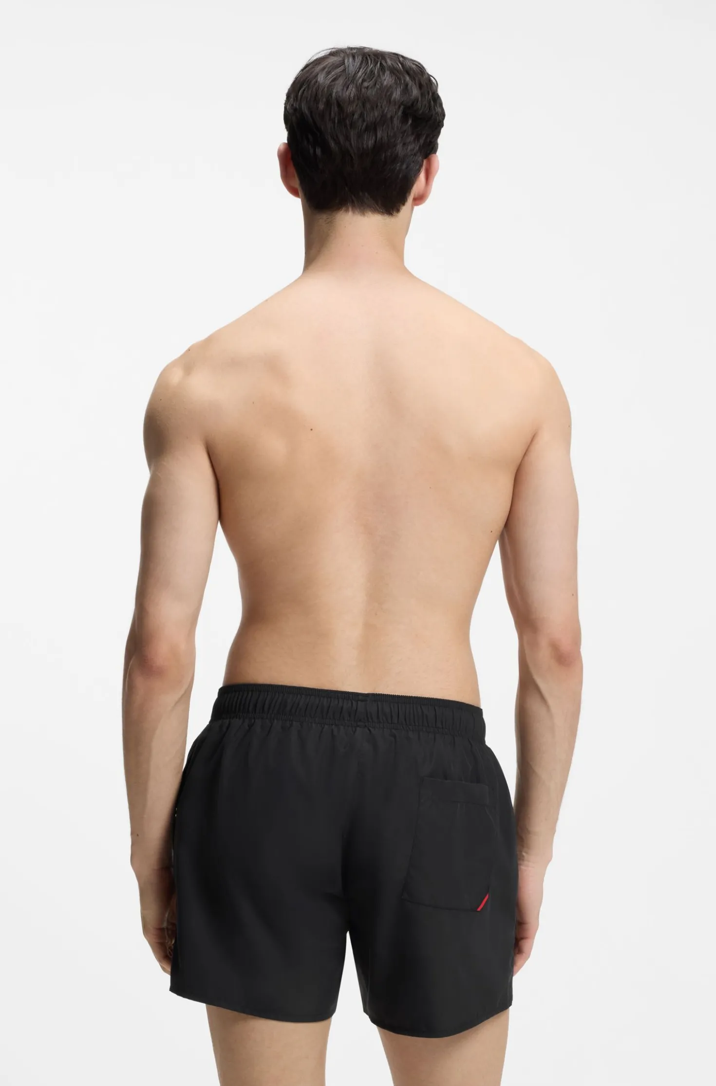 Swim shorts with repeat logos