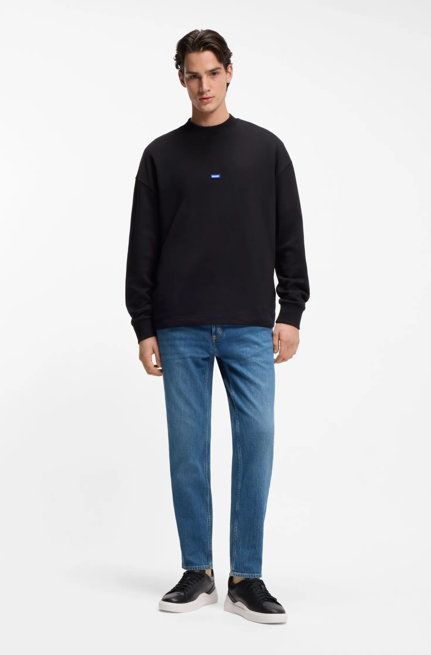 Tapered-fit jeans in mid-blue stretch denim