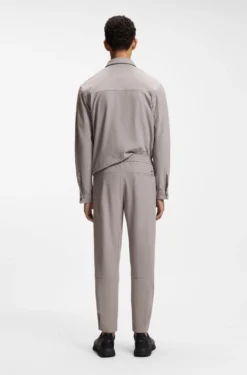 Tapered-fit trousers in waffle-structured stretch fabric