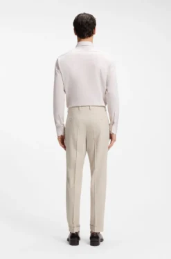 Tapered-fit trousers in wool-blend seersucker fabric