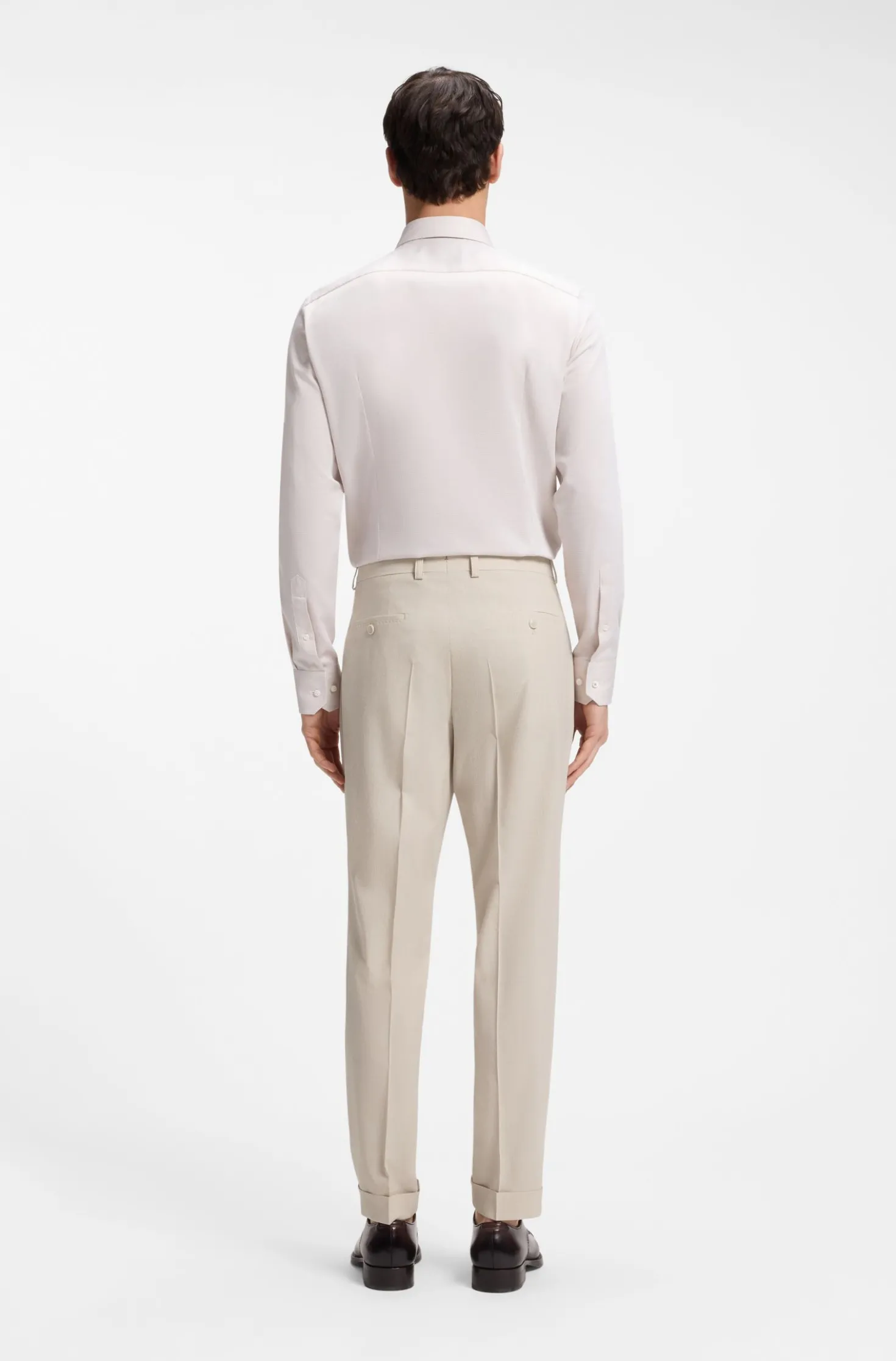 Tapered-fit trousers in wool-blend seersucker fabric