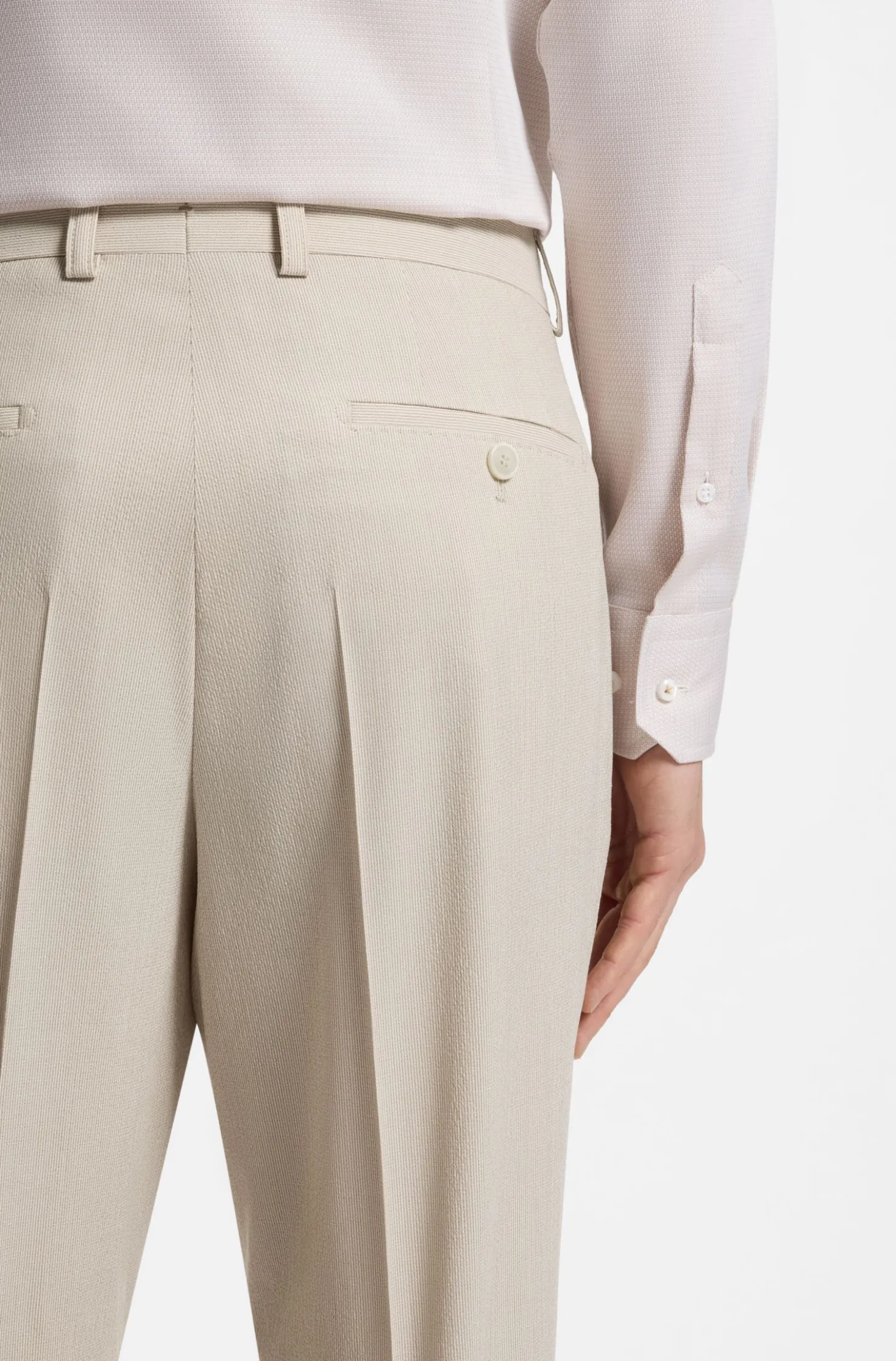 Tapered-fit trousers in wool-blend seersucker fabric