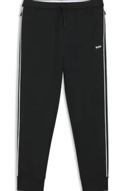 Triangle-jacquard tracksuit bottoms with rubberised logo