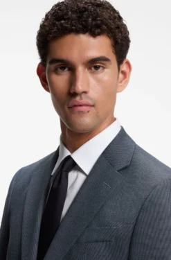 Two-piece suit in micro-patterned stretch fabric