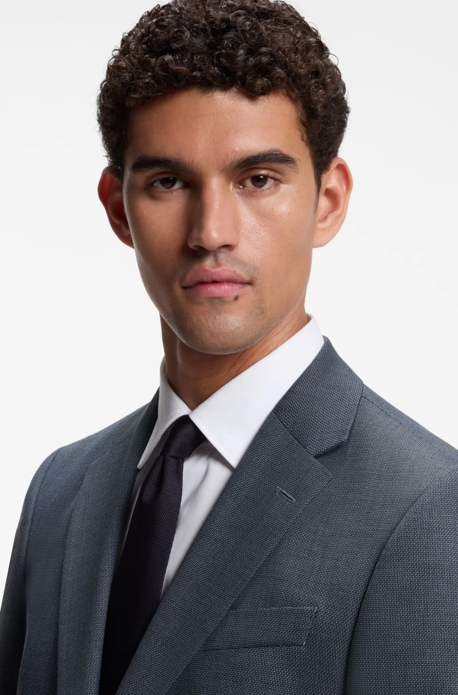Two-piece suit in micro-patterned stretch fabric