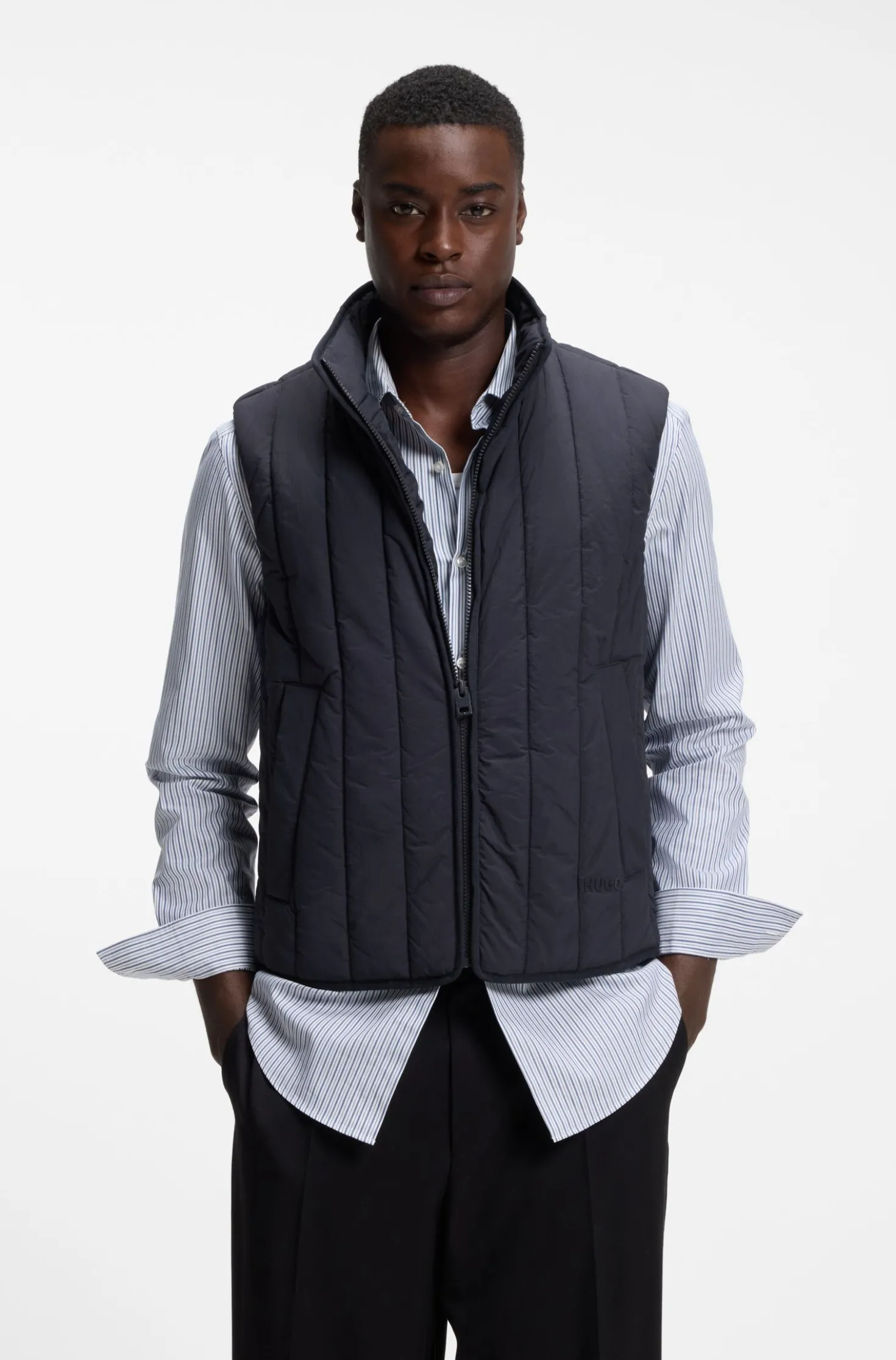 Vertical-quilted gilet with logo detail