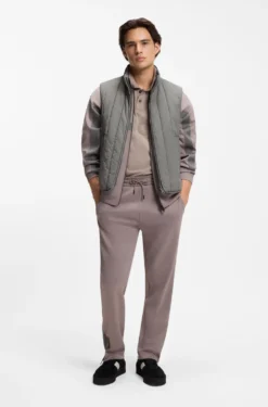 Vertical-quilted gilet with logo detail