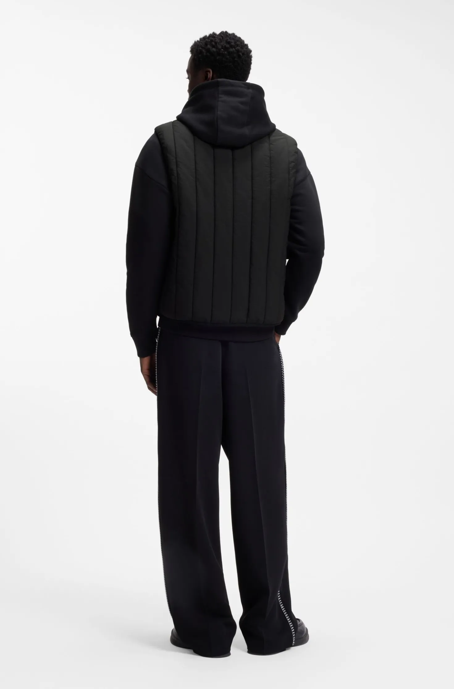 Vertical-quilted gilet with logo detail