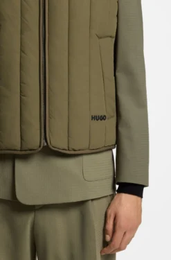 Vertical-quilted gilet with logo detail