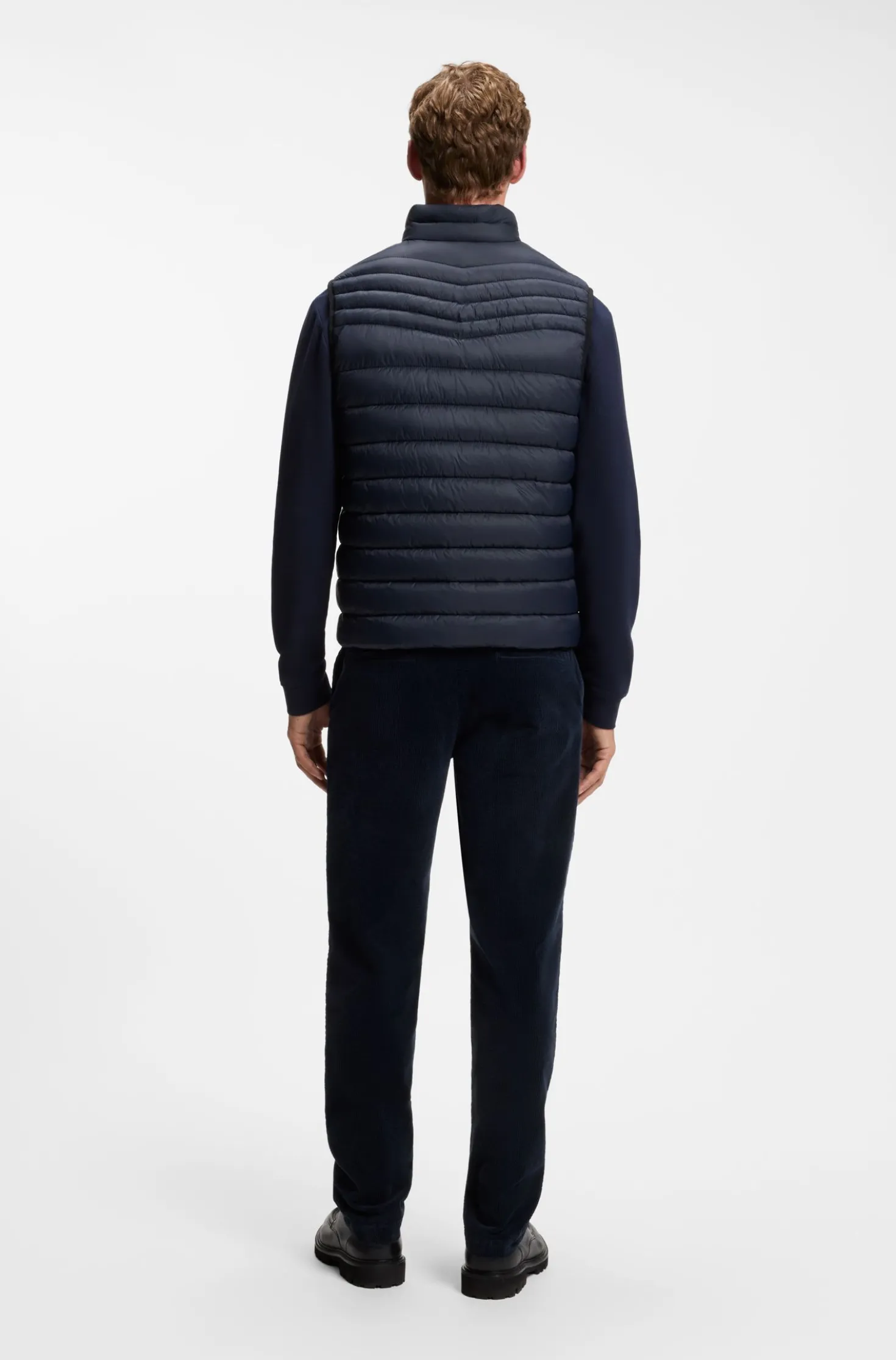 Water-repellent gilet with logo patch