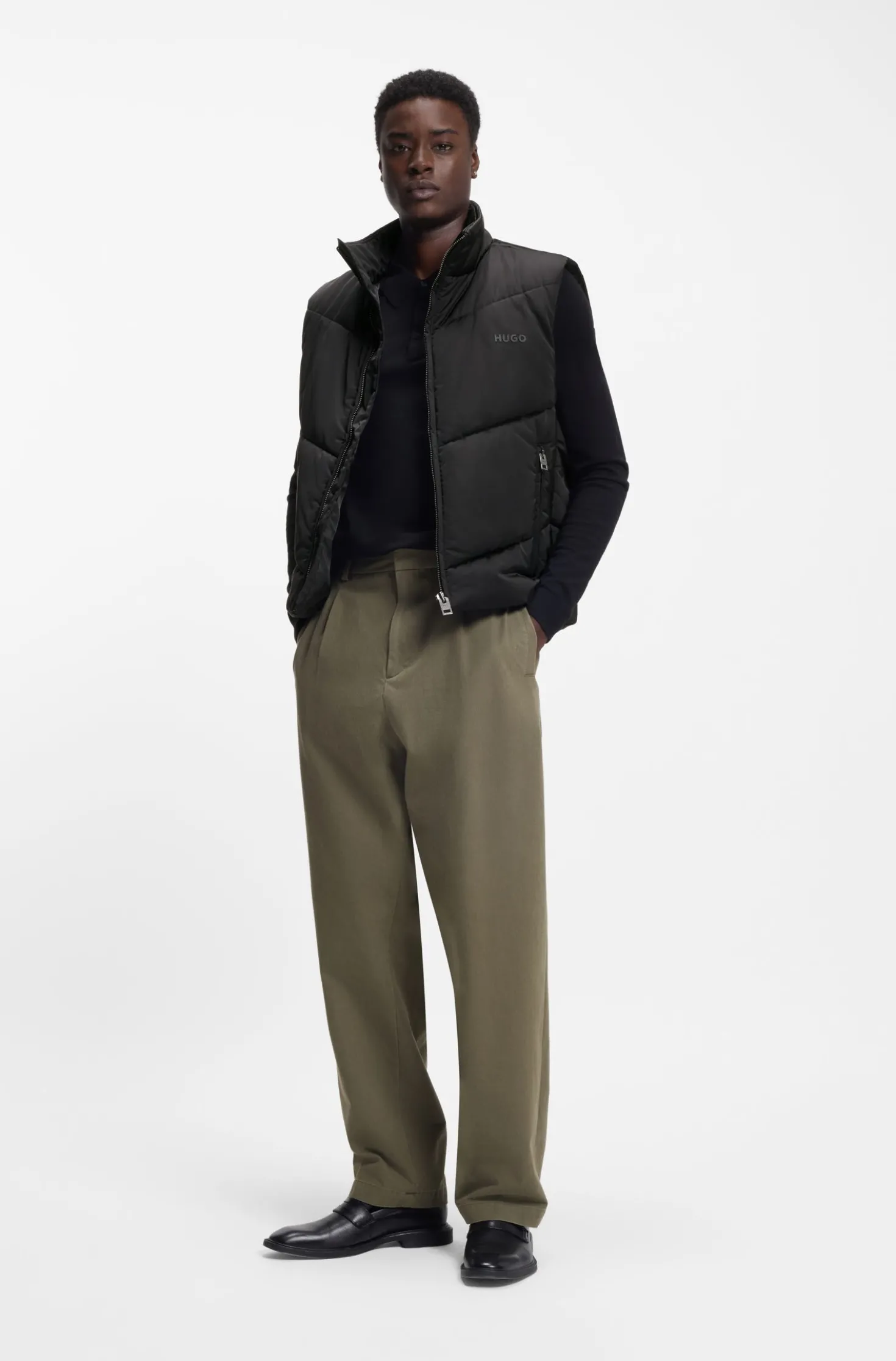 Water-repellent gilet with tonal logo