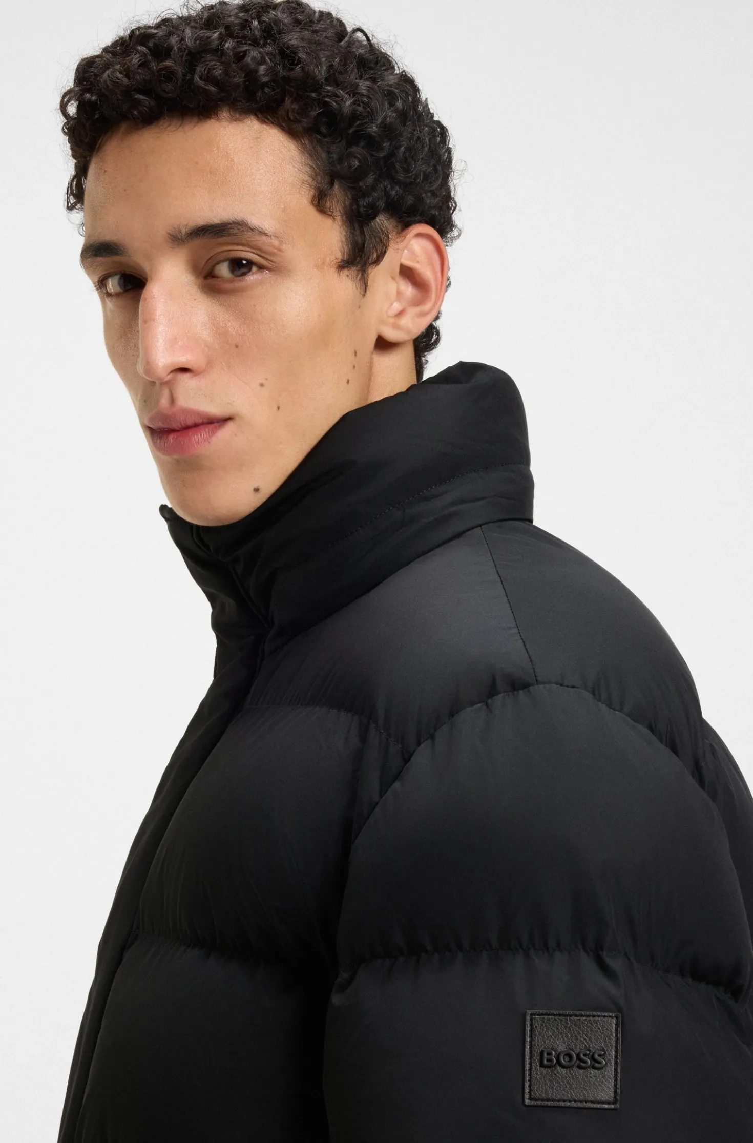 Water-repellent jacket with logo badge