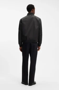 Water-repellent jacket with monogram-pattern sleeves