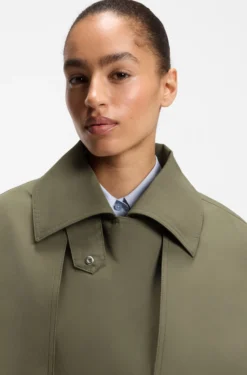 Water-repellent trench coat with belt