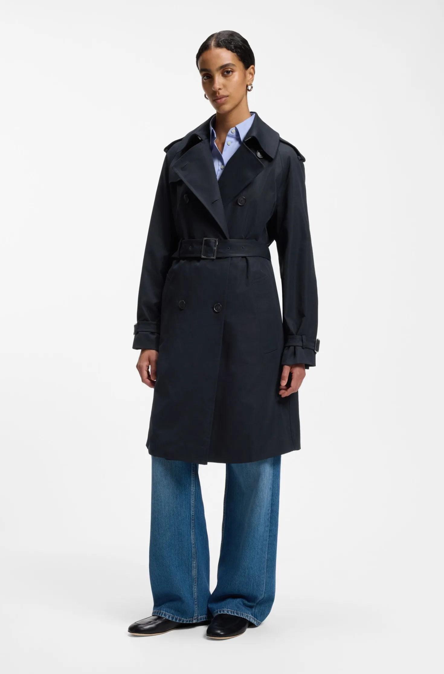 Water-repellent trench coat with buckled belt