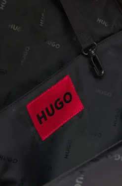 Zipped backpack with rubber logo patch
